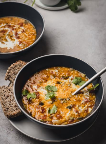 Banga soup in a black bowl