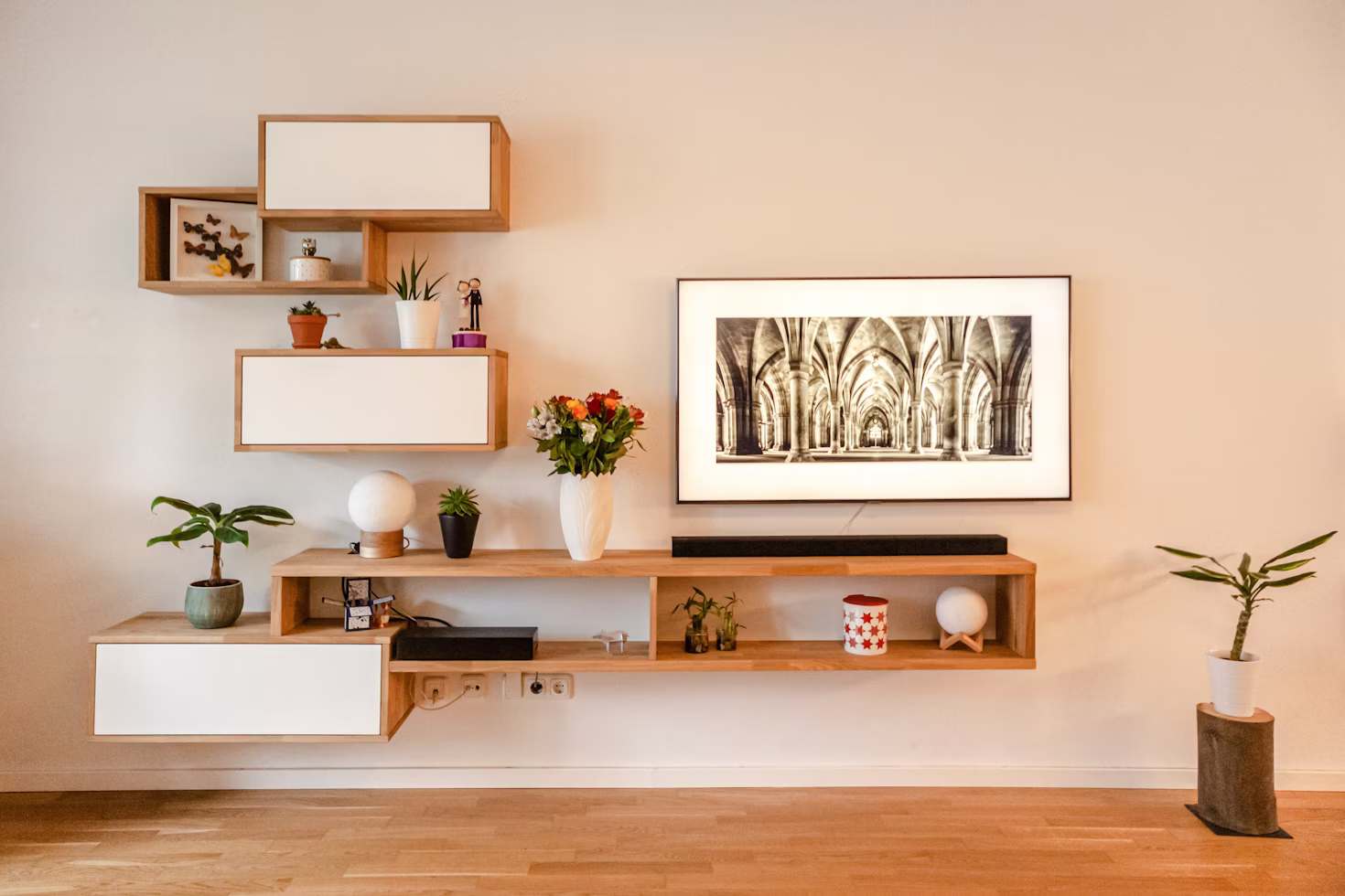 White wooden wall-mounted shelf with white wooden frame