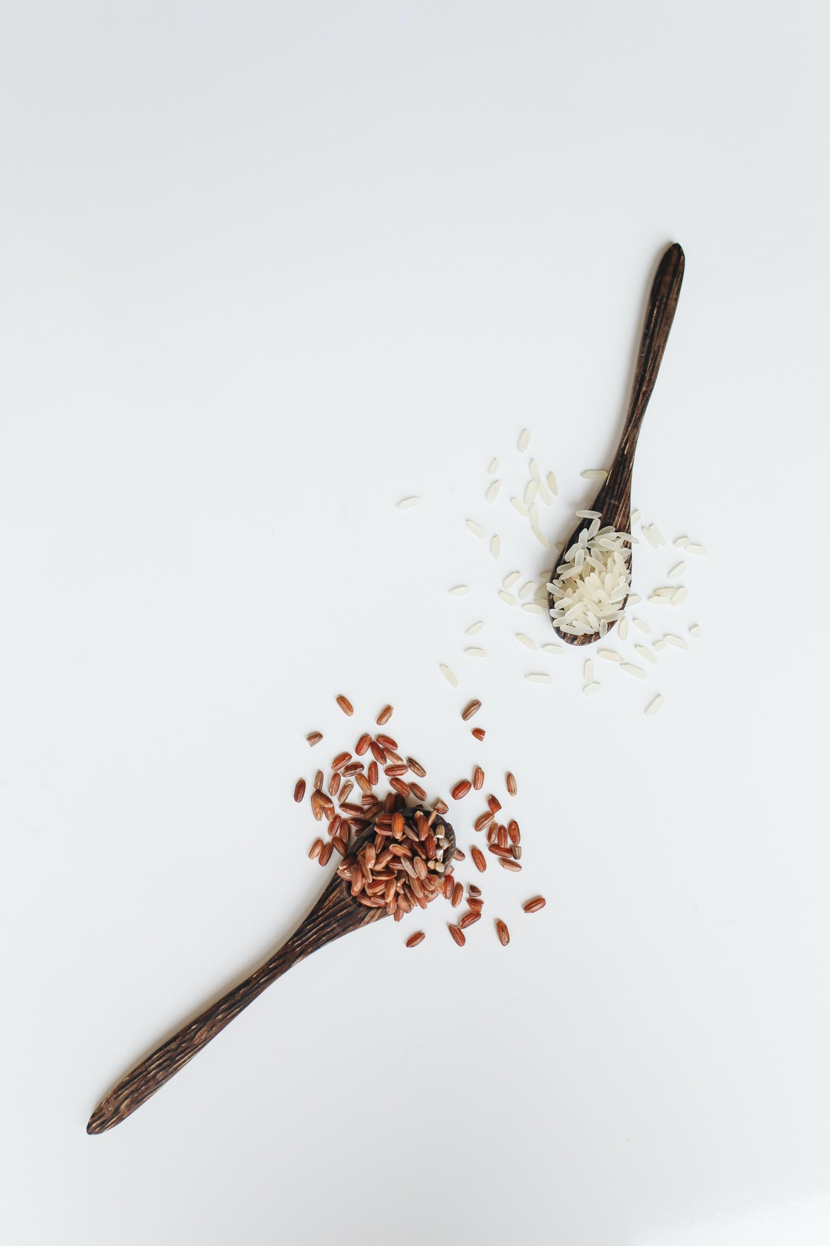 Rice Grains on a wooden spoon