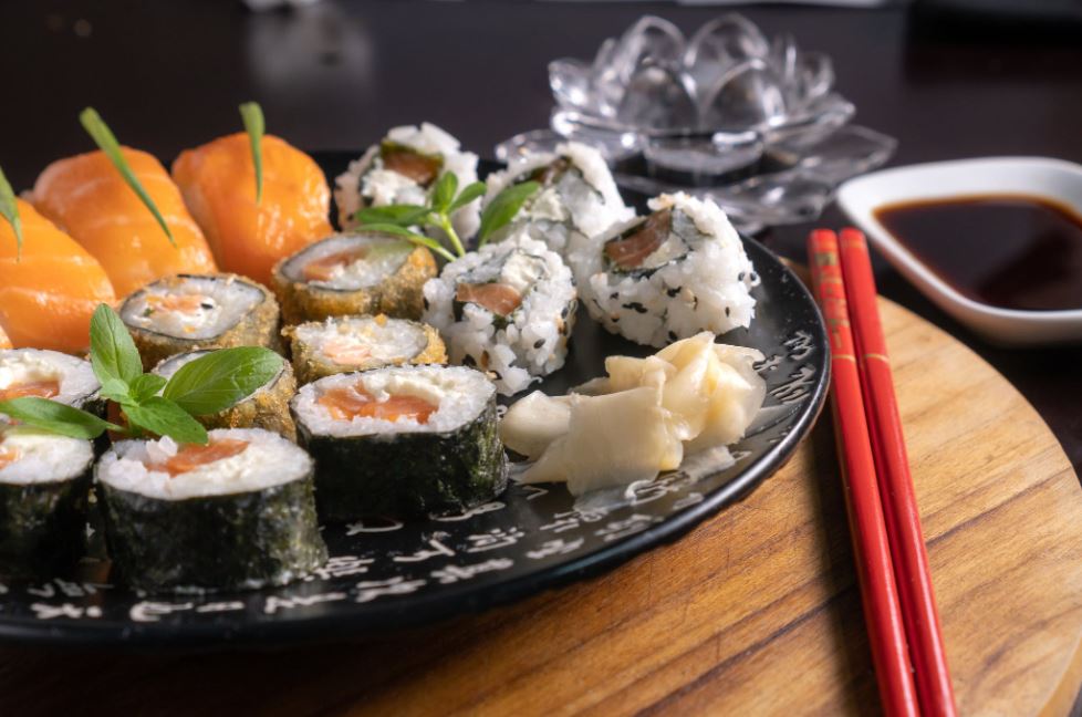 assorted sushi rolls on a plate