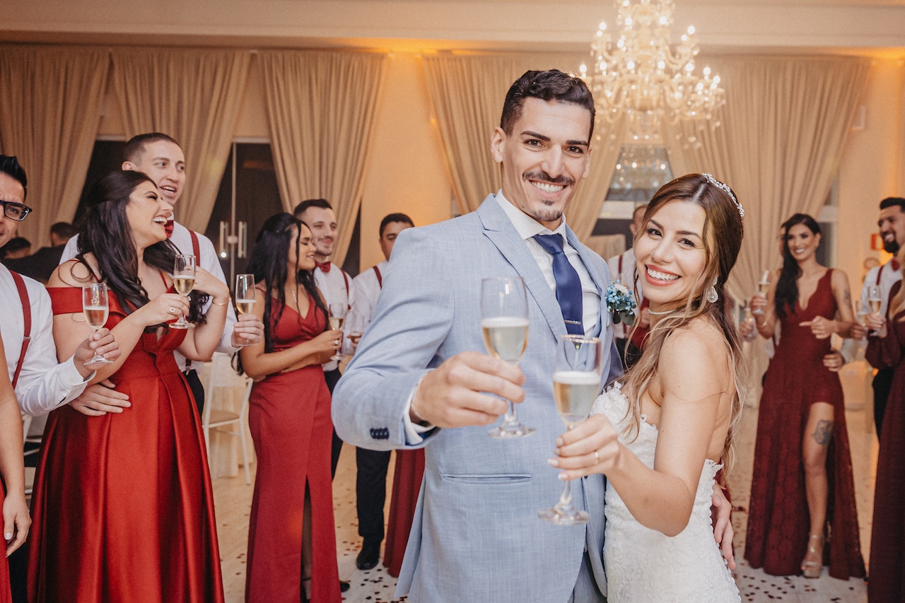 People holding champagne glasses